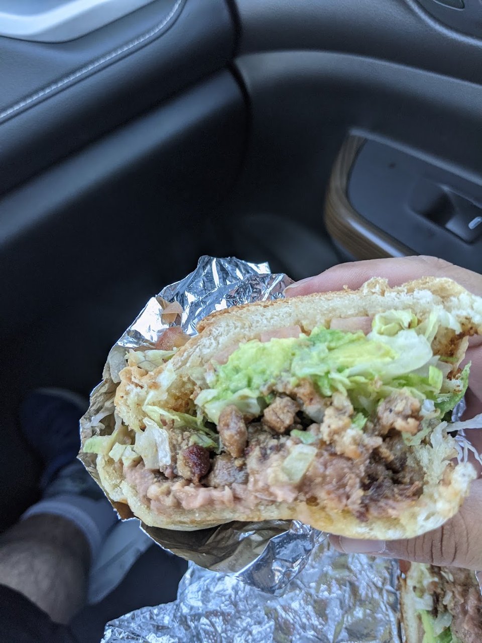 Printed menu with breakfast burritos and quesabirrias.
